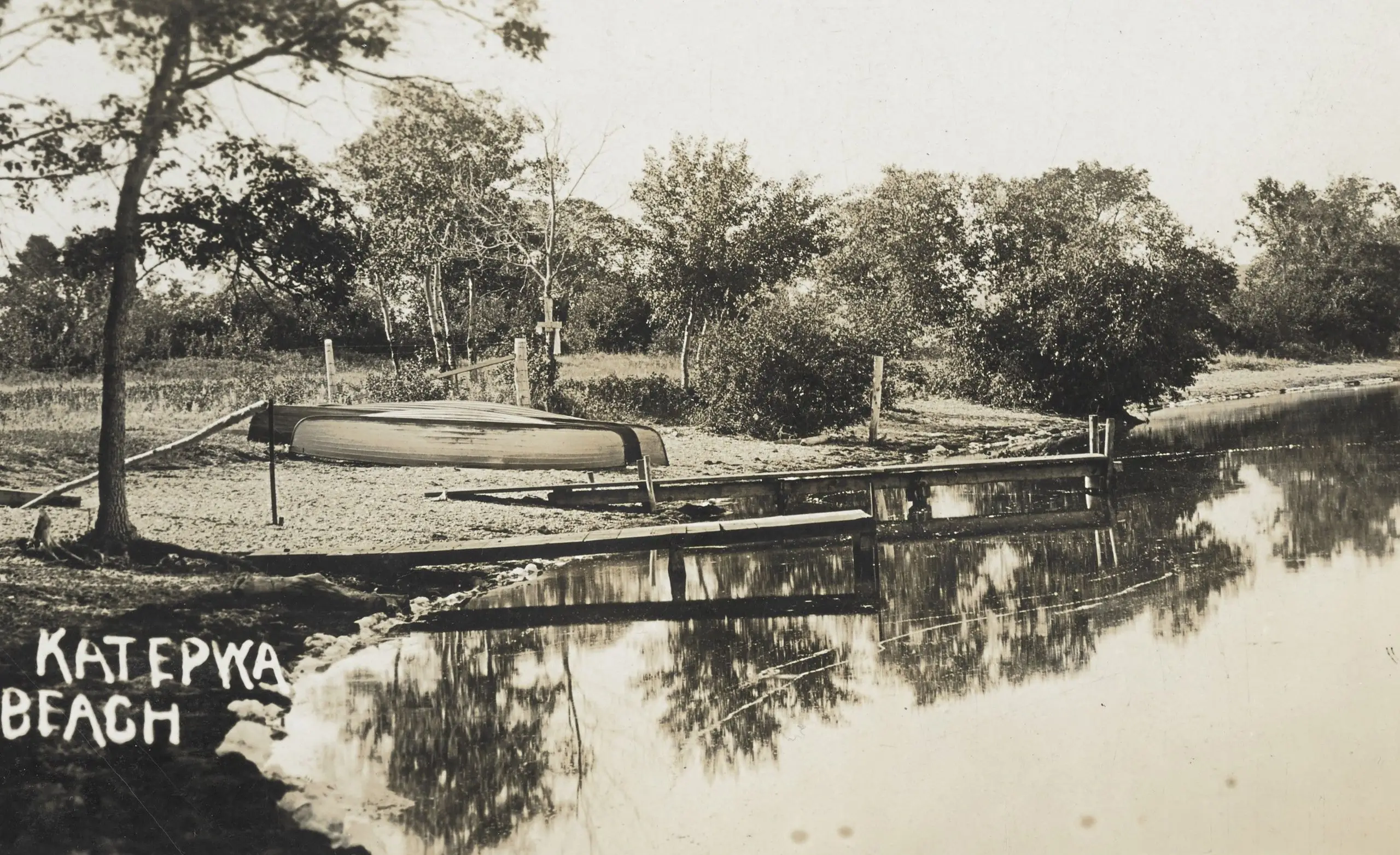 Katepwa Beach with overturned boat and dock